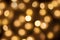 Golden lights bokeh blurred background, abstract beautiful blurry silver Christmas holiday party texture, copy space