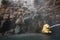 Golden lion and cobblestone masonry. The base of the Samson fountain in a water curtain, close-up. Background photo