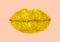 Golden lips of glitter on pastel pink background