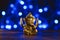 Golden lord ganesha sculpture over blue illuminated background. Celebrate lord ganesha festival