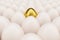 Golden, luxury egg in a centre. Background of white chicken eggs with one golden egg. Symbol of easter, holidays