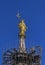 The Golden Madonnina on the roof of Duomo Cathedral, Milan, Italy