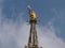 Golden madonnina statue outside Milan Cathedral