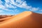 Golden Majesty: Sahara\\\'s Endless Dunes Under Azure Sky