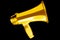 Golden megaphone black background isolated closeup, gold metal loudspeaker, loudhailer, speaking trumpet, bullhorn, announcement