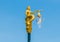 Golden mermaid street lamp.