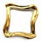 Golden metal frame of a curved curve of a fancy shape on a white background, color play and transitions, an element of design