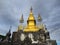 Golden momument on the top of Mount Phousi in Luang Prabang