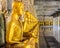 Golden monk statues