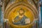 Golden mosaic with Christ Pantocrator in the apse of CefalÃ¹ Cathedral. Sicily, southern italy.