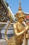 Golden Mythological figure in Wat Phra Kaew temple  Bangkok Thailand