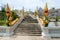 Golden naga snakes on staircases of buddhist temple in Thailand