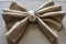 Golden napkin bow with silver ring fancy folding for holiday