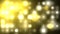 Golden, New Year`s video of boke, in the form of yellow iridescent rings, against a background of shimmering white round spots.