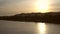 Golden Nile river cruise landscape sunset Egyptian desert and hill side view