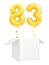 Golden number eighty three inflatable balloon with golden ribbon flying out of blank white box isolated on white