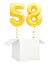 Golden number fifty eight inflatable balloon with golden ribbon flying out of blank white box isolated on white