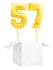 Golden number fifty seven inflatable balloon with golden ribbon flying out of blank white box isolated on white