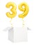 Golden number thirty nine inflatable balloon with golden ribbon flying out of blank white box isolated on white