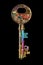 Golden old key full of colorful symbols