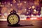 Golden old pocket watch with bokeh balls