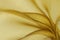 Golden organza fabric texture