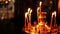 Golden Orthodox candle holder with burning candlesticks