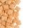 Golden pads corn flakes with copy space background. Cereals texture.