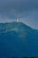 Golden Pagoda located on the top of a mountain with dramatic sky at phu thap boek, Phetchabun, Thailand