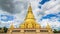 Golden Pagoda Sri Vieng Chai Of Lamphun, Thailand (pan shot)