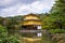 Golden Pavilion and reflections on a Pond, background is a beaut