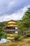 Golden Pavilion and reflections on a Pond, background is a beaut