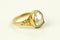Golden pearl ring isolated