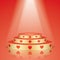 Golden pedestal with red hearts and scene lighting.