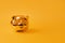 Golden piggy bank on yellow background. Golden money box. Money pig, money saving, moneybox, finance and investments concept. Free