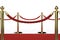 Golden pillar with rope barrier on red carpet