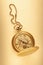 Golden pocket watch with chain