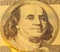 Golden Portrait of Benjamin Franklin on a one hundred dollar ban