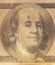 Golden portrait of U.S. president Benjamin Franklin