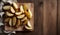 Golden Potato Wedges on Wooden Table with Cloth Backdrop, Copy Space