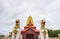 Golden Puttakaya chedipagoda with two giant Chinthe at the entrance,Sangkhlaburi district,Kanchanaburi,Thailand.