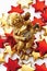 Golden putto on golden and red stars