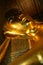 Golden reclining Buddha statue