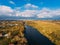 Golden red sunlight AERIAL view, Russia, River, small town, bridge