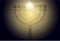 Golden religious menorah isolated on background