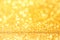 Golden rich expensive abstract background with bokeh effect, shining sparkles, shimmer jewels