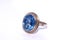 Golden ring with blue aquamarine