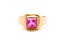 Golden ring with ruby