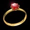 Golden ring with ruby gem isolated on black