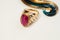 Golden ring with the ruby. jewelry background